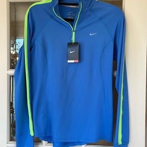 NWT women’s Nike size Medium running shirt